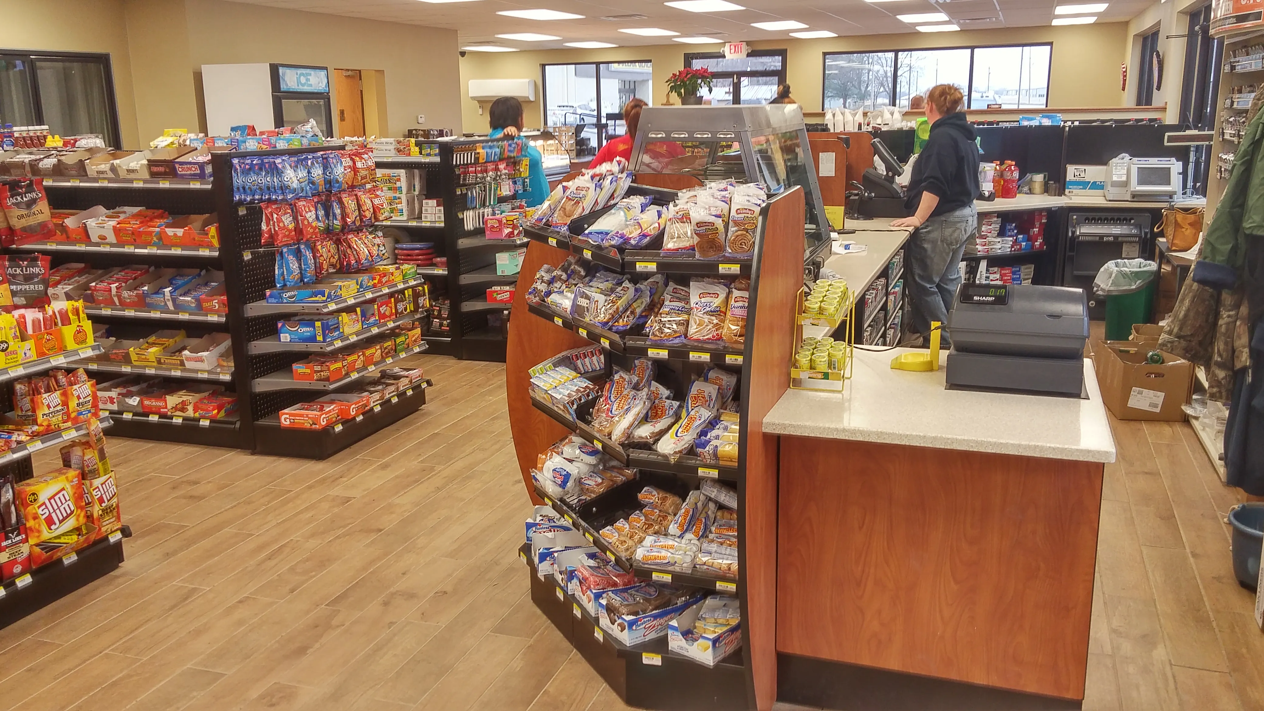 Cashier side view in a convenience store